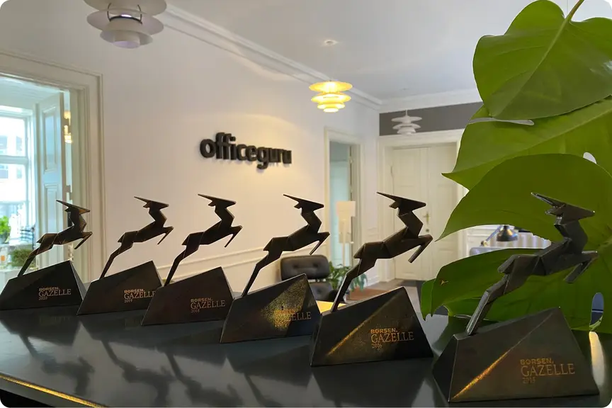 Gazelle awards lined up on the front desk at Officeguru office