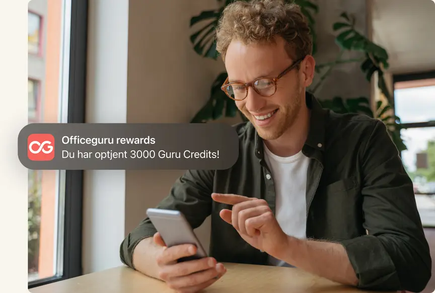 A person getting a notification about an officeguru reward